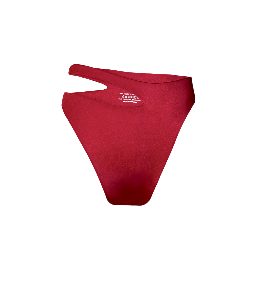 An asymmetric high waisted bordeaux  swimwear bottom.
