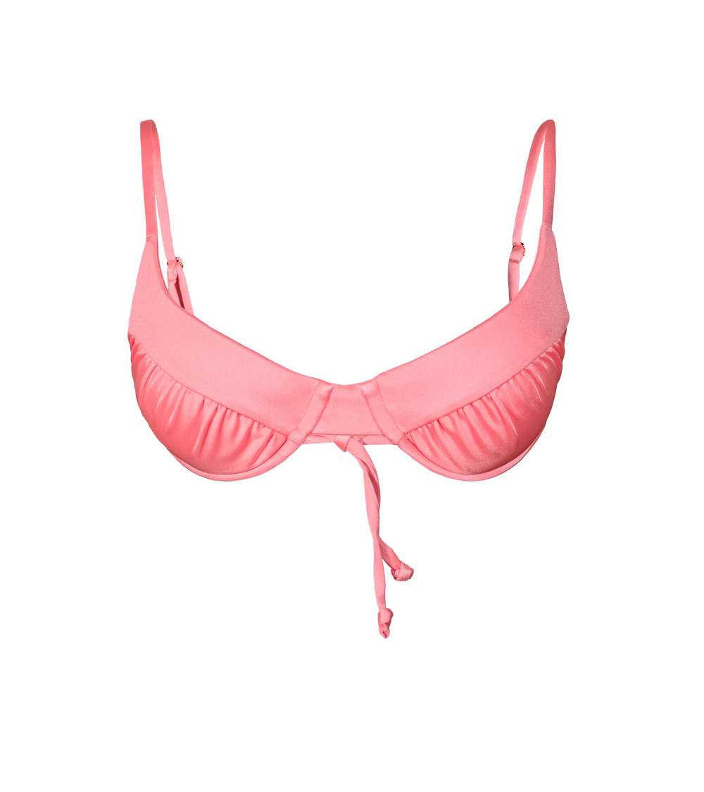 A bright orange-pink swimwear top with structured underwire design and ruched details. The bikini top has an elegant tie in the back for customizable it.