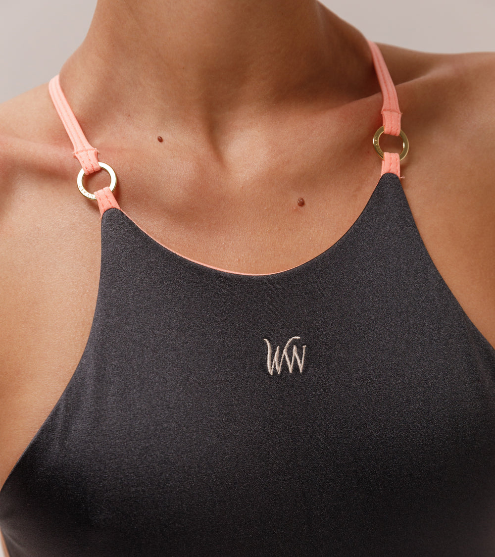 Close-up view of the Wealthywet logo 1925 one piece swimsuit in Chateau
