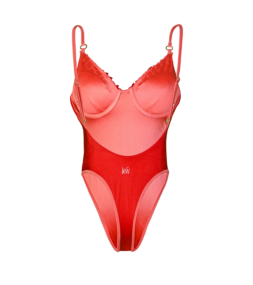 Elegant red one-piece swimsuit from the back. WW logo in the middle, adjustable straps with gold hardware, and a high-cut leg design. The bikini has pink lining and straps.