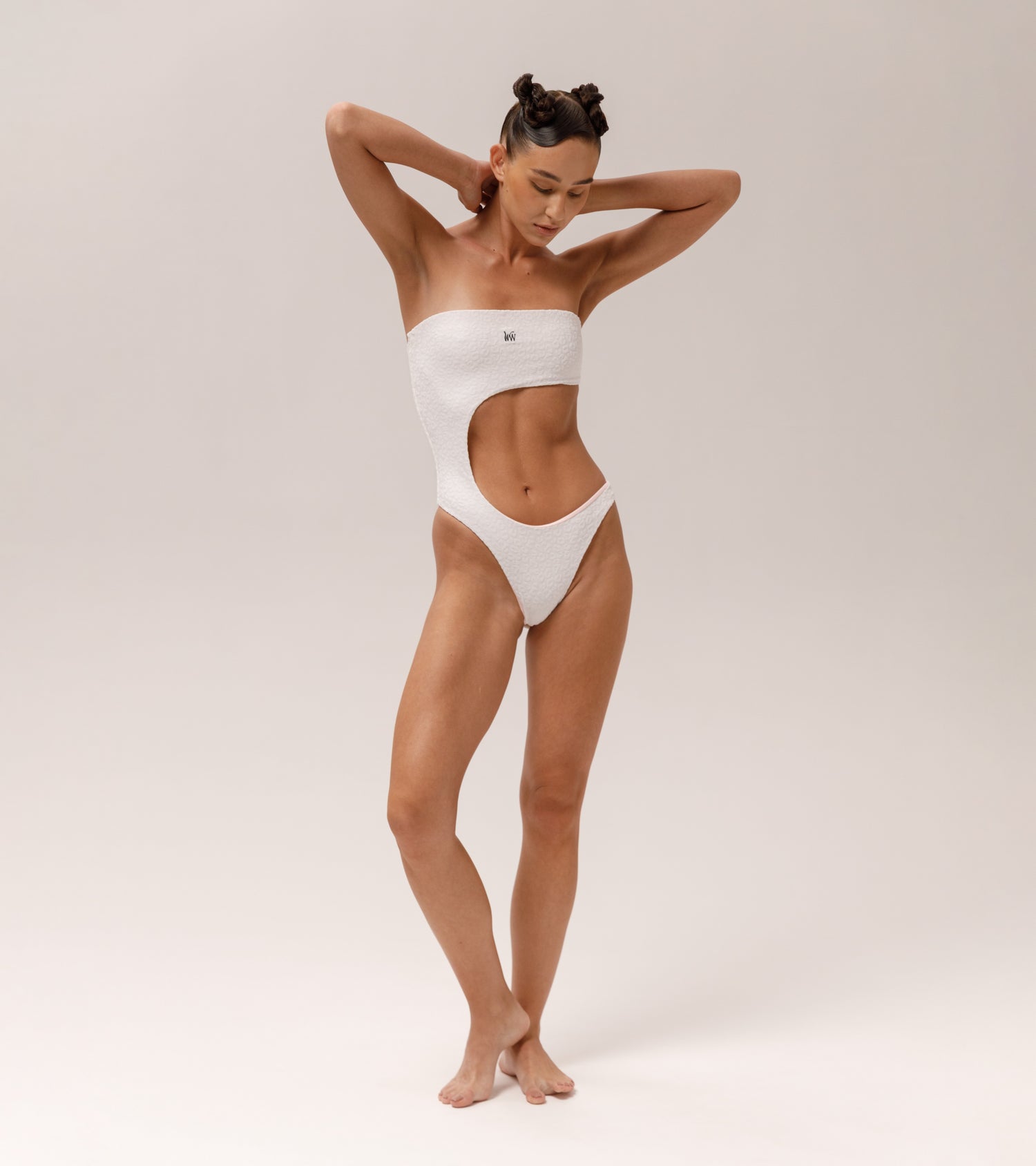 Front view of the Wealthywet 1971 one piece swimsuit in White Savannah